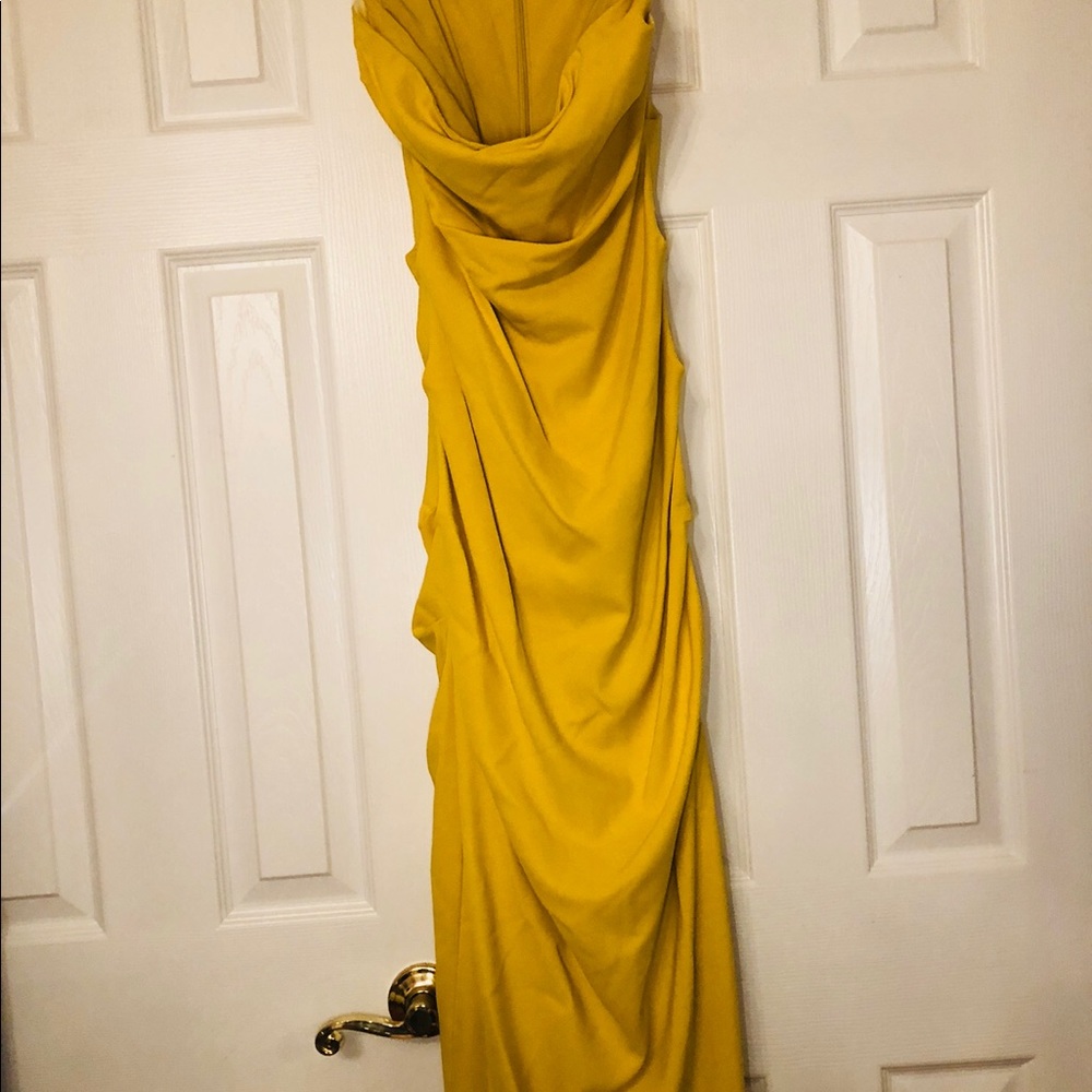 Yellow strapless Nicole Miller tight Gown